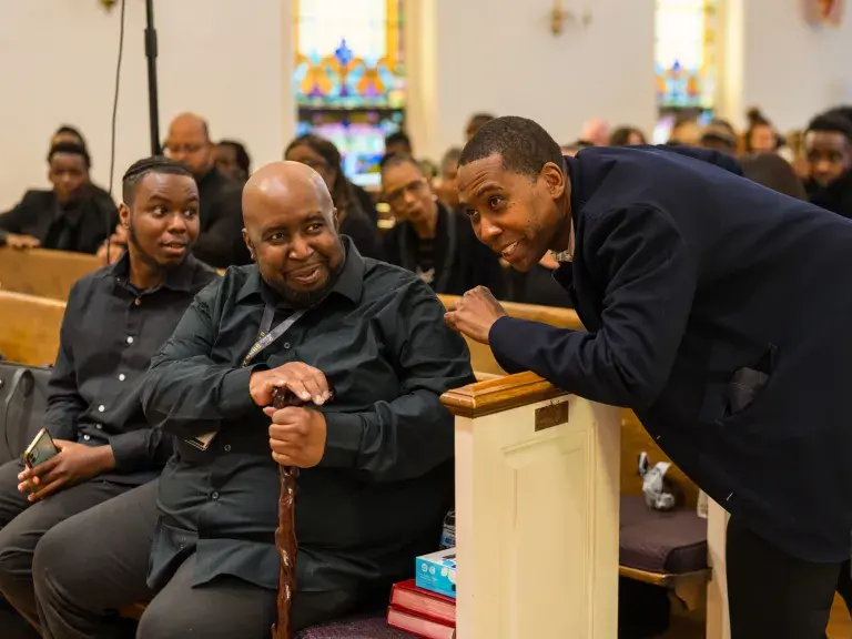 three men talking at the Bent But Not Broken Conference 