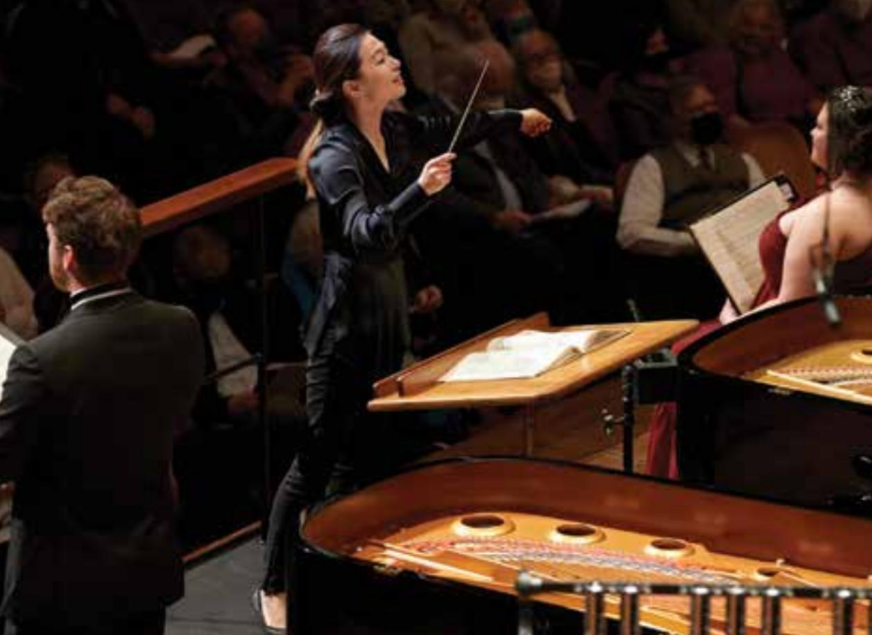 Woman conducting 
