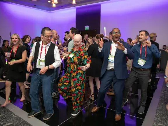 group of people dancing on dance floor