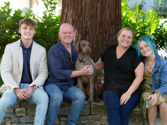 Barnett with his family: son JT, wife Jamie, daughter Claire and family dog Walter