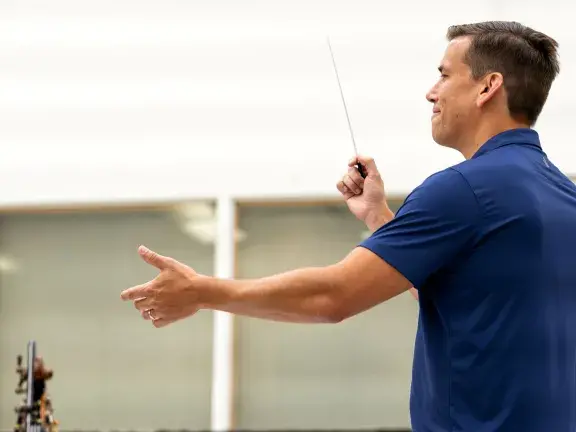 man conducting