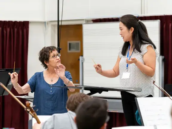faculty member coaching student