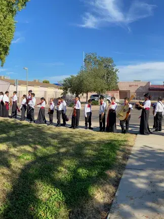 Mariachi students prepare to perform