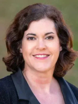 Mary Ann East smiling at camera
