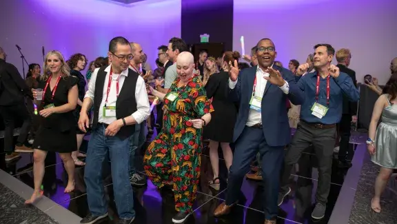 group of people dancing on dance floor