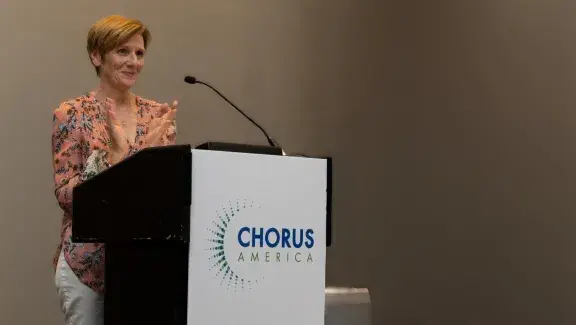 Catherine speaking at Conference