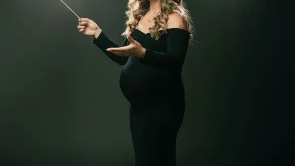 Marie conducting