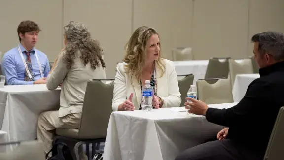 speed networking event participants talking